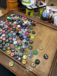 Bottle cap table with poured resin surface: Diy Bottle Cap Table With Epoxy Resin Saved By Scottie