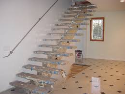 Elegant and modern stainless steel stairways are often combined to the transparency of glass to achieve a unique shiny and light staircase design. Staircases Railings Platforms Altona Custom Metal Works
