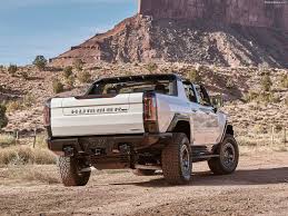 Each features a white exterior. Gmc Hummer Ev 2022 Pictures Information Specs