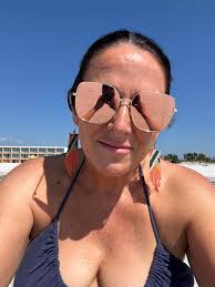 What does the sun with sunglasses tag mean and how do I get it I can't find  it anywhere, and my melody is telling me he's travelling soon. I have a  cabin