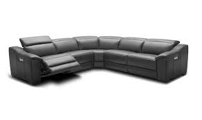 The sectional as an incredibly modern appearance, with its wide arms, curved edges, and sectioned back, but the real appeal of the. Advanced Adjustable Curved Sectional Sofa In Leather Grand Rapids Michigan J M Furniture Nova Ozzy