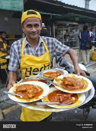 כדי לעזור לך להתמצא ברחבי ג'ורג'טאון, הנה שם העסק וכתובתו בשפה המקומית. Transfer Road Roti Image Photo Free Trial Bigstock