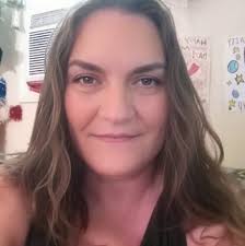 How long should plants sit in water when using bottom watering?