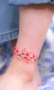 Furious snake on the woman's back #43. Tattoo Designs Flower Tattoo On Ankle Cherry Tattoos Blossom Tattoo