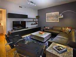 This rustic living room was brought to us by country living and it had the best foundation for the decorating. Gray Contemporary Living Room Vanessa Deleon Hgtv