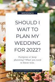 Should I Wait To Plan My Wedding For 2022 Should You Postpone Your Wedding Plan My Wedding Wedding Planning Advice Wedding Planning Tips