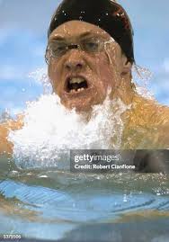Steven McBrien of NSW in action during the Mens 100 metres... News Photo