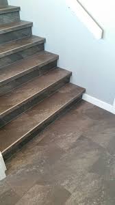 Luxury Vinyl Tile Installed With Custom Insert Stair Nosings Tile Stairs Stair Nosing Stairs