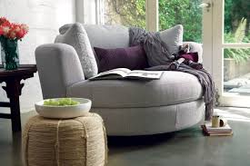 Pleasureable Grey Fabric Snuggle Chair With Small Rounded Ottoman Tab Comfortable Living Room Chairs Comfortable Living Room Furniture Comfortable Living Rooms
