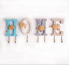 Free shipping on orders of $35+ and save 5% every day target/home/decorative coat hooks hardware (533)‎. Rustic Home Creative Letter Design Decorative Wall Mounted Coat Hooks Clothing Towel Hanger Garment Rack House Items Buy Online In Cayman Islands At Desertcart