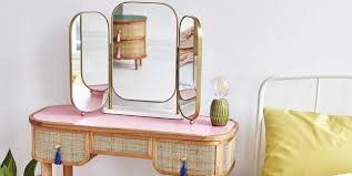 French art deco mahogany dressing table with a brown leather top that lifts to reveal a folding mirror in addition to two drawers and three shelves behind a door. Dressing Table Ideas How To Decorate And Style A Vanity Table