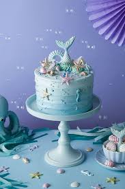 Mermaid Cakeunder The Sea This Rippled Mermaid Buttercream Cake Is Decorated With Golden Shells Pastel Sea H Mermaid Birthday Cakes Mermaid Cakes Party Cakes