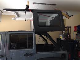 We don't just set the bar, we keep pushing it higher! Best Homemade Hardtop Lift Jeepforum Com Diy Jeep Jeep Hard Top Jeep Hardtop Storage