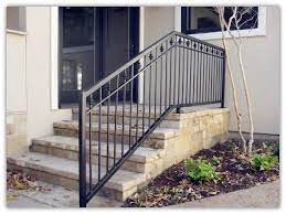 Smiling business woman standing on stairs at office building and holding h. Rustproof Wrought Iron Railings Metal Railing Outdoor Stairs Buy Wrought Iron Railings Metal Railing O Railings Outdoor Outdoor Stair Railing Porch Handrails