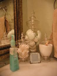 Decorative bathroom canisters ideas for 50th birthday. Home Sellers Should Consider The Way Personal Toiletries Are Displayed This Look De Personalizes Them And Makes T Apothecary Jars Bathroom Decor Bathroom Spa