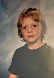 Could someone please make my son's pic a little clearer?.. maybe add a  background I'd appreciate it