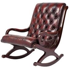 Have you recently inherited or purchased an antique rocking chair and want to know its value? French Vintage Tufted Leather And Mahogany Rocking Chair At 1stdibs