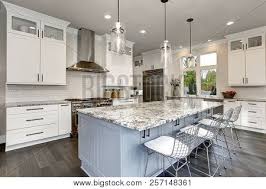 Use the home designer tools to create floor plan variations and generate your ideal room layout. Beautiful Modern Kitchen In Luxury Home Interior With Huge Island Poster Id 257148361