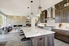 An open concept home decorated with stylish mirrors and various wall arts mounted on the white walls. The 100 Best Open Kitchen Ideas Kitchen And Home Design