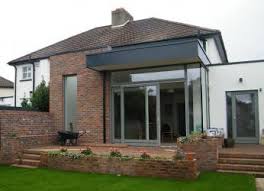 Design ideas for a contemporary living room in melbourne with grey walls and grey floor. House Extension Ideas From Dublin Architects And Builders