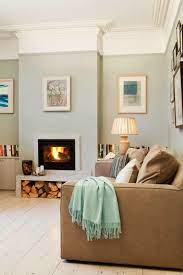 12 Best Calm Paint Colors Try These Top Picks From Designers Now Hello Lovely Light Blue Living Room Living Room Paint Blue Living Room