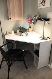 A smaller home office desk for cramped spaces. The Borgsjo Corner Desk Tucks Neatly In A Corner With Enough Top Space And Storage To Make Morning Prep Easy Cor Diy Corner Desk Home Furnishings Home Decor