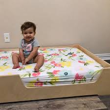Transitioning from the crib to a toddler bed. Low Montessori Floor Bed For Toddlers Sprout
