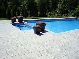 The decking around the pool will wear out at some point, requiring repairs, repair, resurfacing or stamped concrete is a popular decking material for pool surrounds because it is affordable however, over time your stamped concrete may begin to fade and crack, requiring some attention. Stamped Concrete Around Pool Google Search Pool Pavers Stamped Concrete Patio Backyard Pool