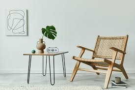 Our collection of unique coffee tables come in elegant marble, gold, wood and more. Premium Photo Minimalist Concept Of Living Room Interior With Rattan Armchair Walnut Coffee Table Tropical Leaf In Vase Clock