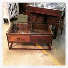 The tempered glass top provides a convenient spot to store magazines, books, or trinkets, and it contrasts beautifully with the wood laminate. Glass Top Coffee Table With Drawers Nadeau Huntsville