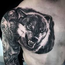 50 Realistic Wolf Tattoo Designs For Men Canine Ink Ideas Wolf Tattoo Design Tattoo Designs Men Wolf Tattoos Men