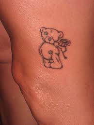 Below, we are going to mention winnie the pooh tattoo ideas and designs. A Tattered Teddy Bear On My Leg Teddy Bear Tattoos Bear Tattoos Foot Tattoos For Women