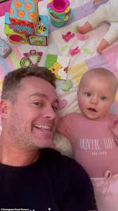 Grant Denyer shares an adorable video of his baby daughter Sunday enjoying  playtime