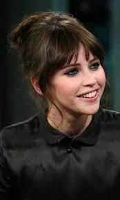Long straight bangs will help narrow long face oval. Pin By Claudia Roman On Felicity Jones Hairstyle Hair Styles Pinterest Hair