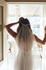 Leaving your hair down and straight, curled, or wavy creates a simple and classic look that pairs nicely with a tulle or mantilla veil. Top 8 Wedding Hairstyles For Bridal Veils