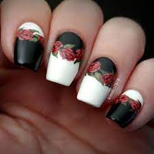 Alternate white and black tips with stars to stay on cloud nine. Black White W Roses Floral Nails Nails Rose Nails