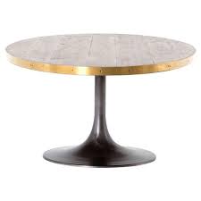 The unique single pedestal base is made from strong cast aluminum to support a heavy top whilst eliminating the unnecessary clutter of legs underneath. Cressley Industrial Loft Wood Iron Brass Tulip Oval Dining Table 51 D 60 D Kathy Kuo Home