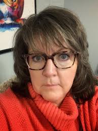 Trimming a child's bangs after six weeks of growth