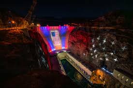 Hoover Dam, challenged by drought, now wears a U.S. flag the size of a football field