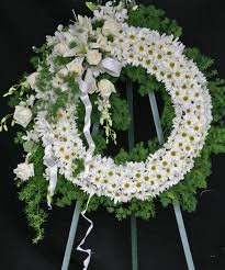 Offering condolences to the family by sending flowers is always thoughtful; A Spectacular Whitle Funeral Wreath Funeral Flower Arrangements Casket Flowers Funeral Floral Arrangements