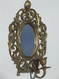 Maybe you would like to learn more about one of these? Vintage Brass Candle Holder Wall Sconce W Mirror In Ornate Oval Frame