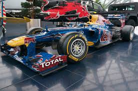 It is one of two formula one teams owned by beverage company red bull gmbh; Red Bull Racing Rb 8 Hangar 7