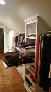 Custom Walk In Closet Slanted Ceilings Double Deep Full Extension Shelves Attic Closet Slanted Ceiling Closet Closet Bedroom