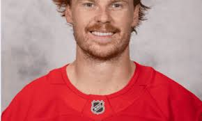 Elmer, Raymond Pace Red Wings Win