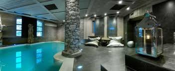 Luxurious Black Pearl Chalet For Stunning Holidays In The French Alps Luxury Retreats Indoor Pool Design Chalet Design