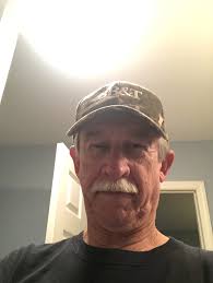 Yales Larry Kelly's 1936 Heisman Trophy is in the foyer of the Peddie  School he attended in Highstown,NJ.