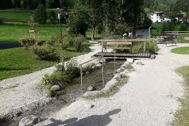 Haus lusspark lermoos, situated close to grubigstein cable car, offers accommodation with a golf course, a sundeck and a sun terrace. Kneipp Baths In The Lusspark In Lermoos Zugspitz Arena