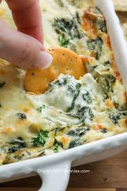A Combination Of 4 Cheeses Make This Spinach Artichoke Dip Irresistible Bake This Spinach Artichoke Dip Recipe Artichoke Dip Recipe Best Spinach Artichoke Dip