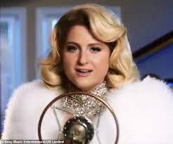 A solo pop version, and a reggaeton version with additional vocals by puerto rican singer yandel. Meghan Trainor Leaves Little To The Imagination In New Music Video Hey Dj Daily Mail Online