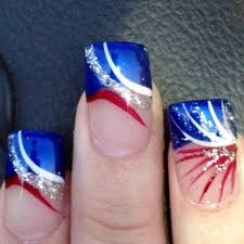 Some of the nails have red and white stripes and the other two nails have blue and white star art. Memorial Day Nail Designs 11 Stylish Trendy